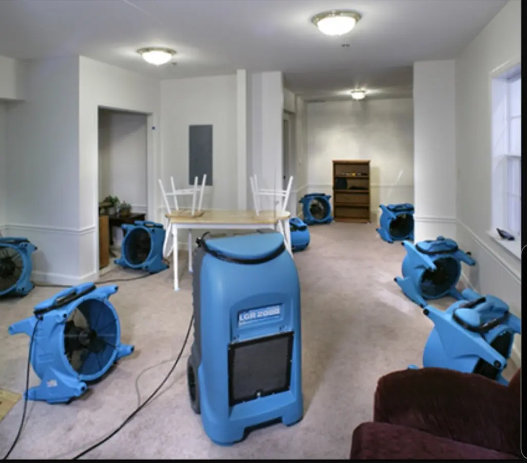 Air movers and dehumidifier setup for Water Extraction & Removal in Perryville